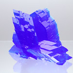 Kuvassa kidevedelllinen kupari(II)sulfaatin pentahydraatti CuSO<sub>4</sub> · 5 H<sub>2</sub>O